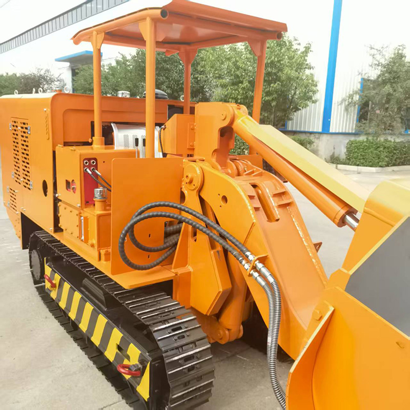 Chargeuse de roches à déchargement latéral de grande taille