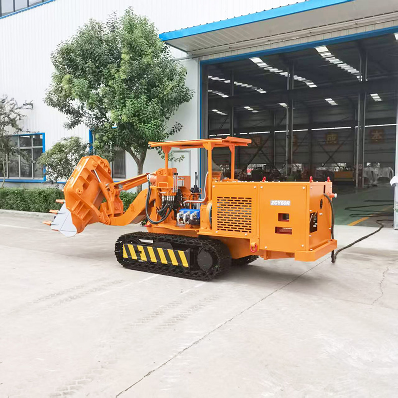 Низкопрофильный самосвальный погрузчик для горных пород