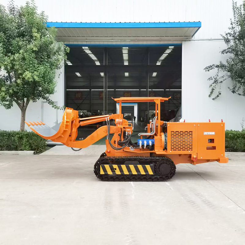 Carregador de rochas de descarga lateral para mineração