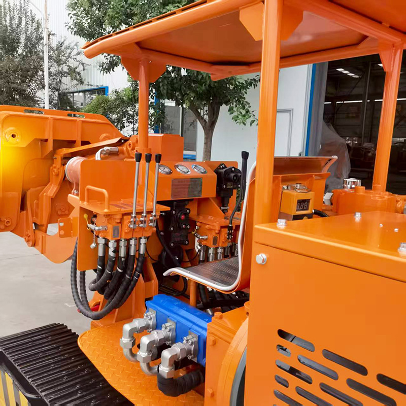 Carregador de rochas com descarga lateral eficiente